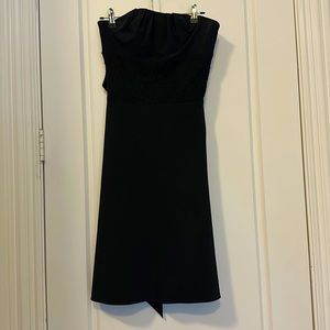 Little black dress with belted bow. Size 0. Lace accent. Gorgeous!